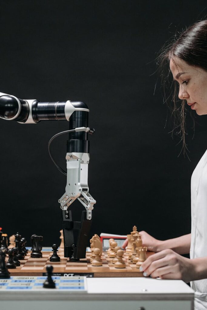 A robot and woman engage in chess, showcasing technology and strategic thinking.